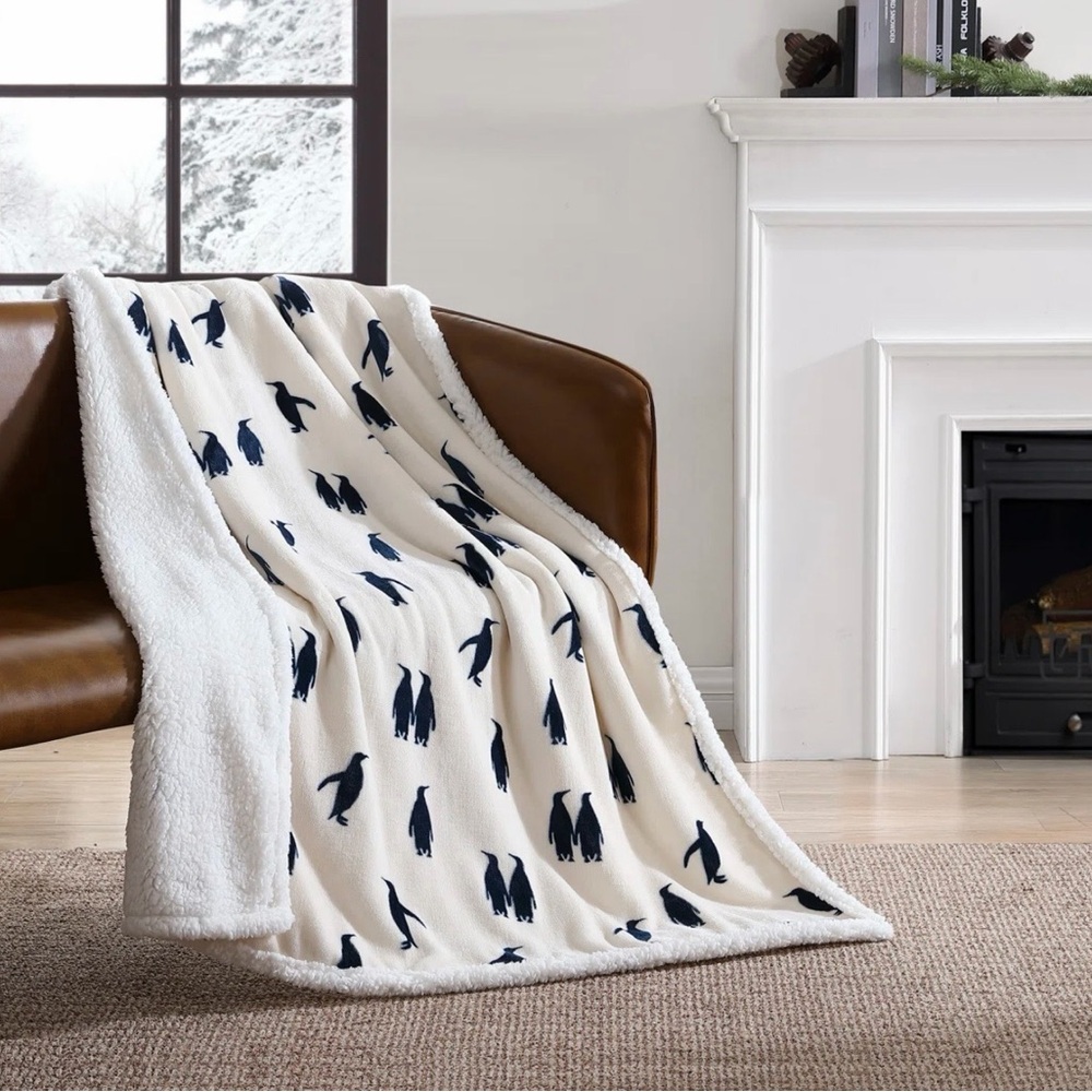 Eddie Bauer
Emperor Penguin Throw Cozy Penguin Print Throw Blanket.